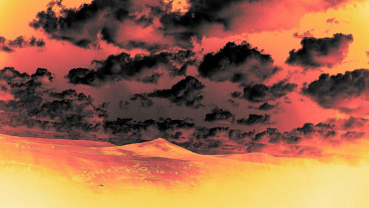 Welsh landscape under dramatic red and black storm clouds with intense gradient overlay