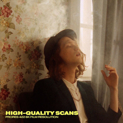 high quality 35mm film grain scan overlay creating a soft cinematic film look with organic texture and analog film aesthetic