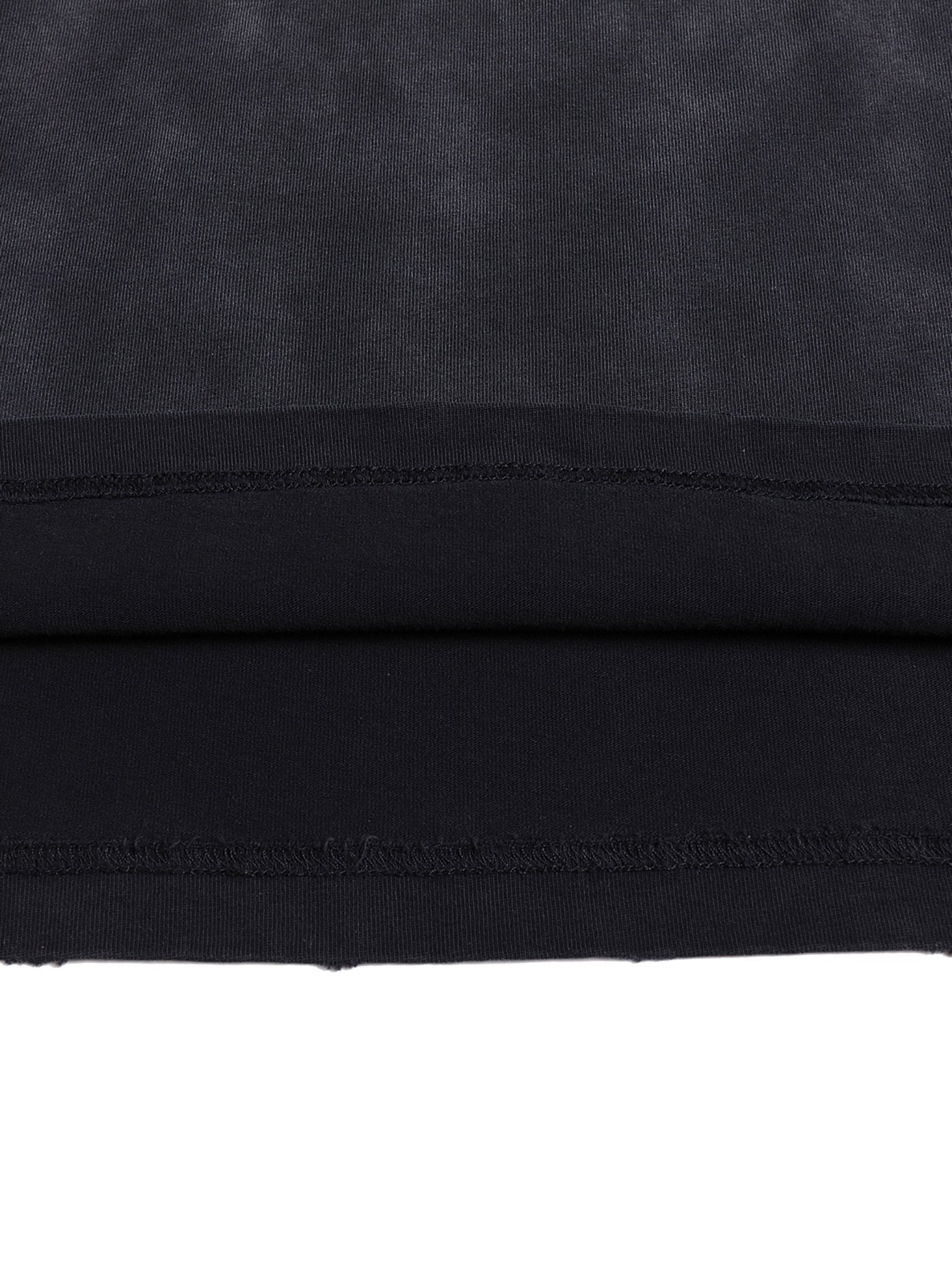 Macro close-up of Bleed Electric A Human Story t-shirt stitching showing durable seams and premium cotton weave