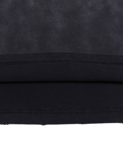 Macro close-up of Bleed Electric A Human Story t-shirt stitching showing durable seams and premium cotton weave
