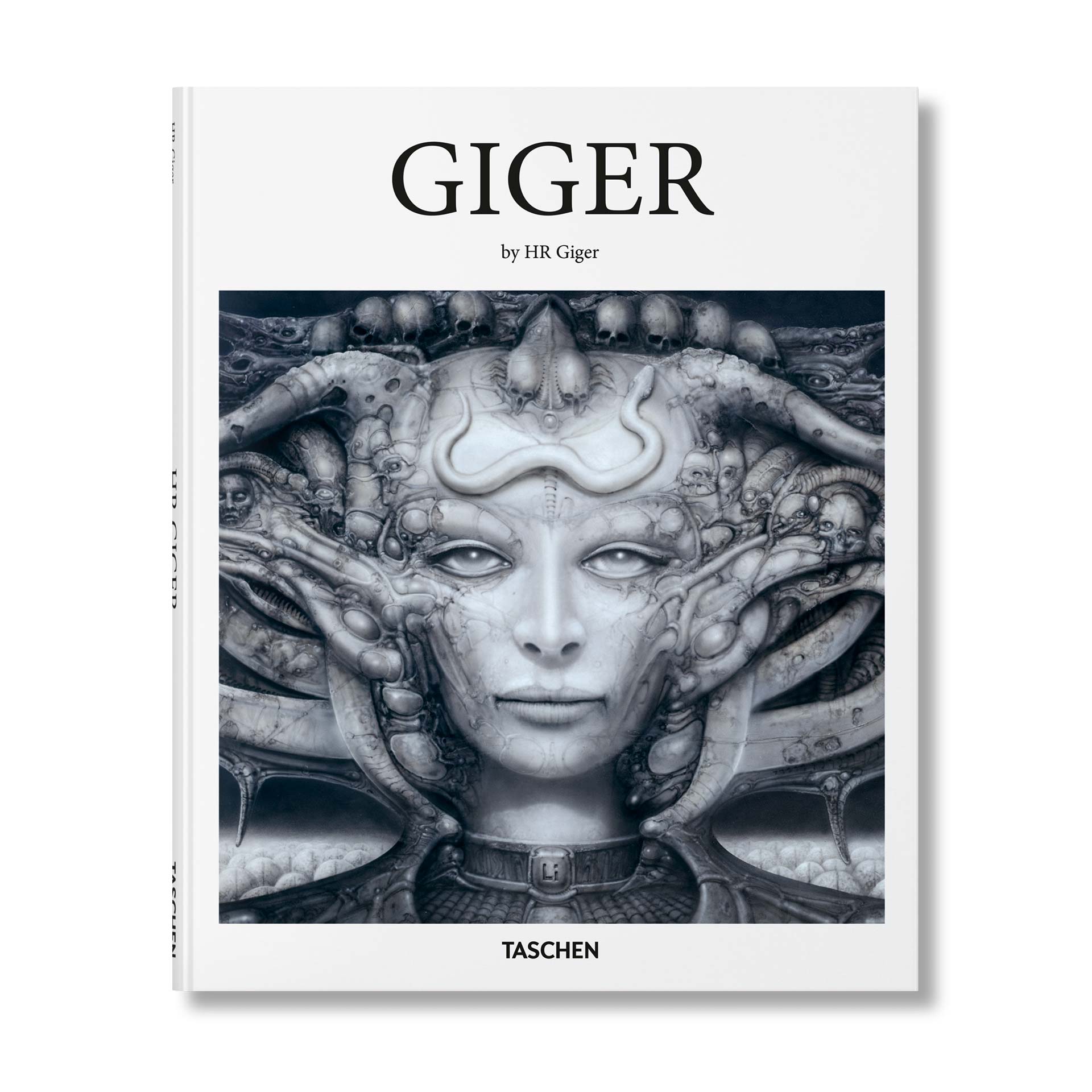 H.R. Giger book cover by TASCHEN featuring a biomechanical female face surrounded by skulls, tubes, and alien forms