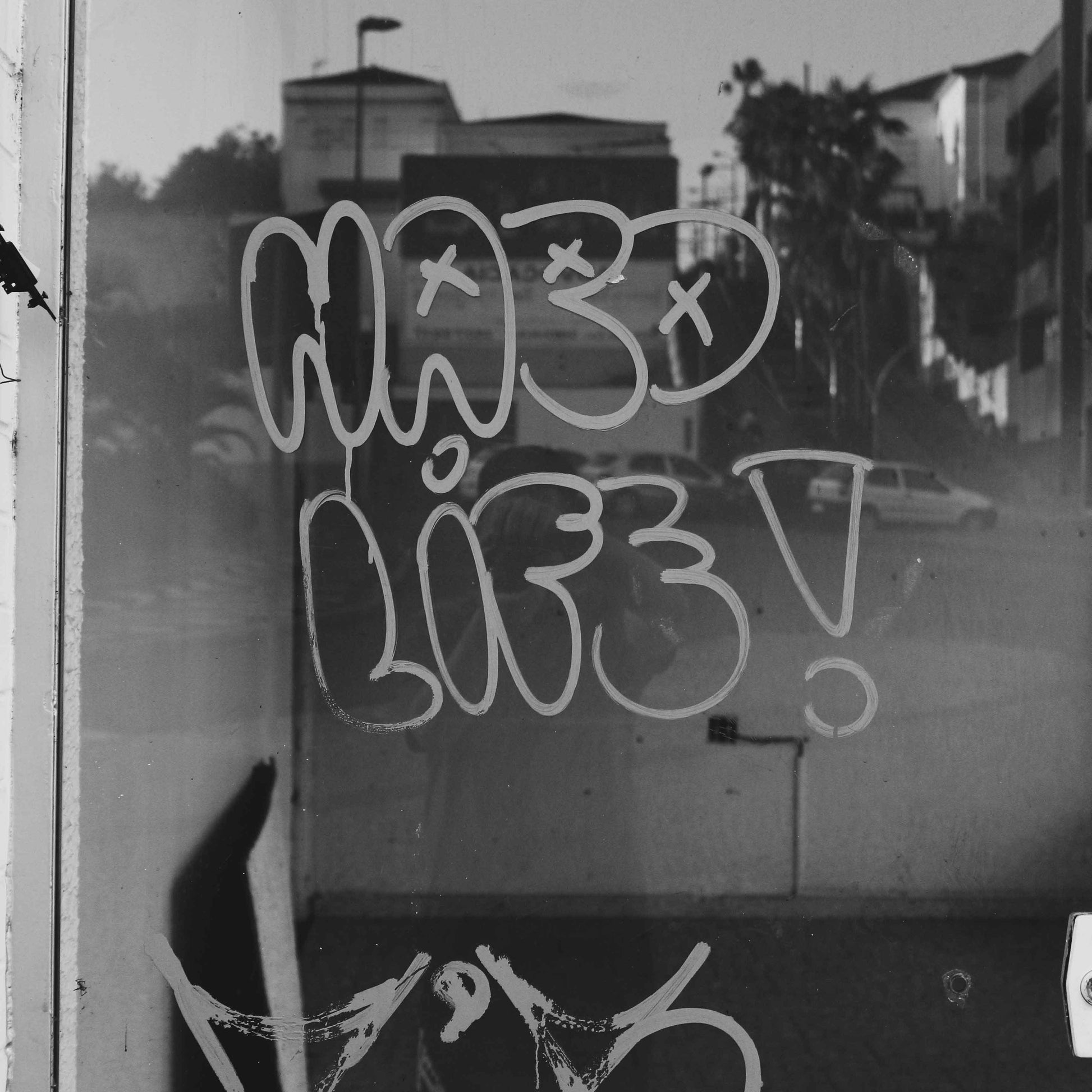 NERF Typeface by HVNTER in bubble-letter graffiti style reading "Hard Life!" on urban glass surface.