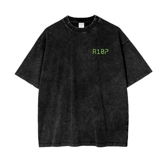 Front of black acid-wash t-shirt with green pixel text reading "R10T" on the chest