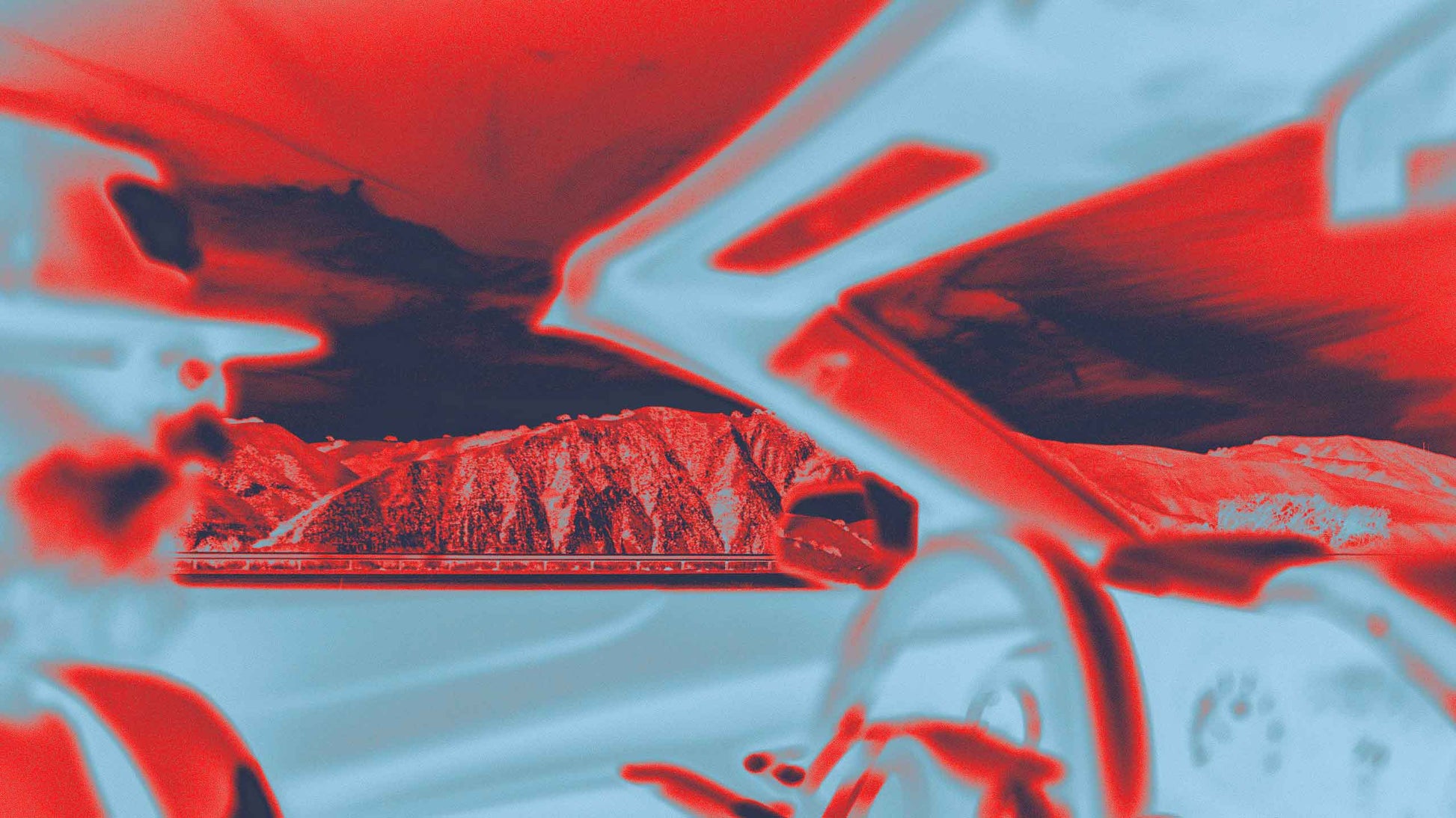 Driver’s perspective in a car featuring bold blue and red thermal gradient effects creating a vivid glitch aesthetic by secret-cache.