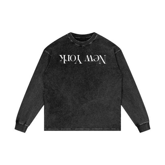 Oversized washed black long sleeve with flipped white NEW YORK chest print — a challenge to perception.
